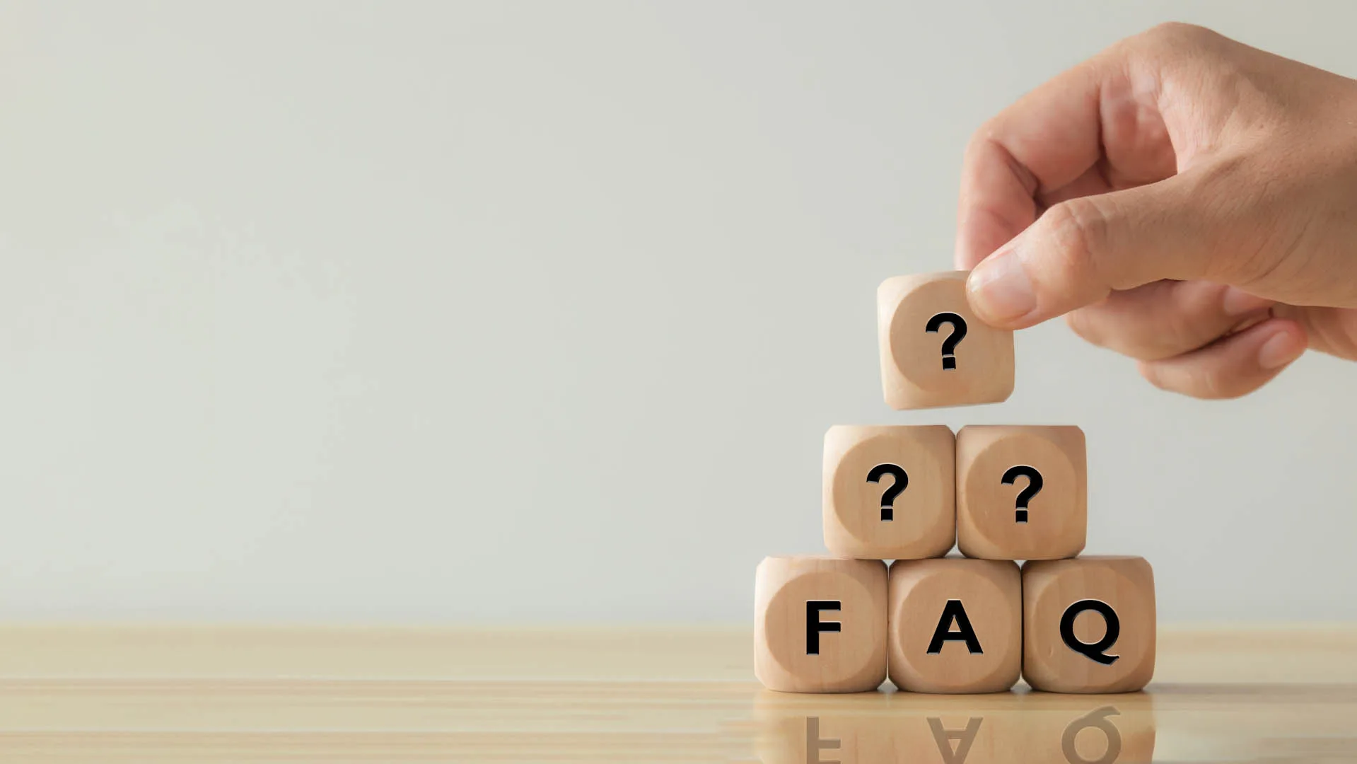 Faq,,Frequently,Asked,Questions,Concept.,Hand,Place,Faq,Wooden,Blocks